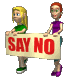 two women carrying a "say no" sign